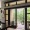 spacious room with greenery outside