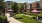 a courtyard with a building in the background