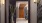 a hallway with a vase of flowers